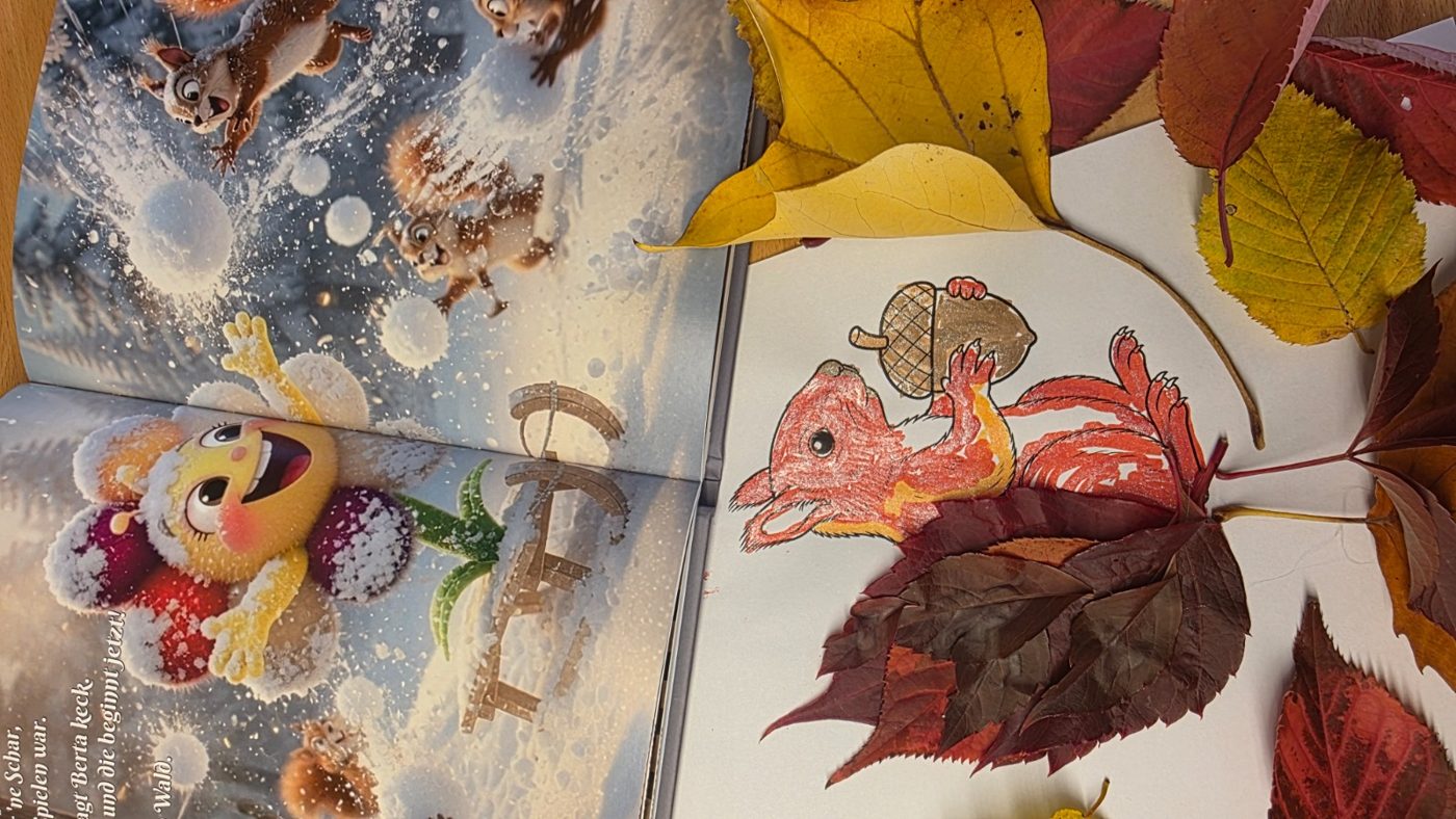 Ausgemaltes Eichhörnchen mit echten Herbstblättern als Schwanz